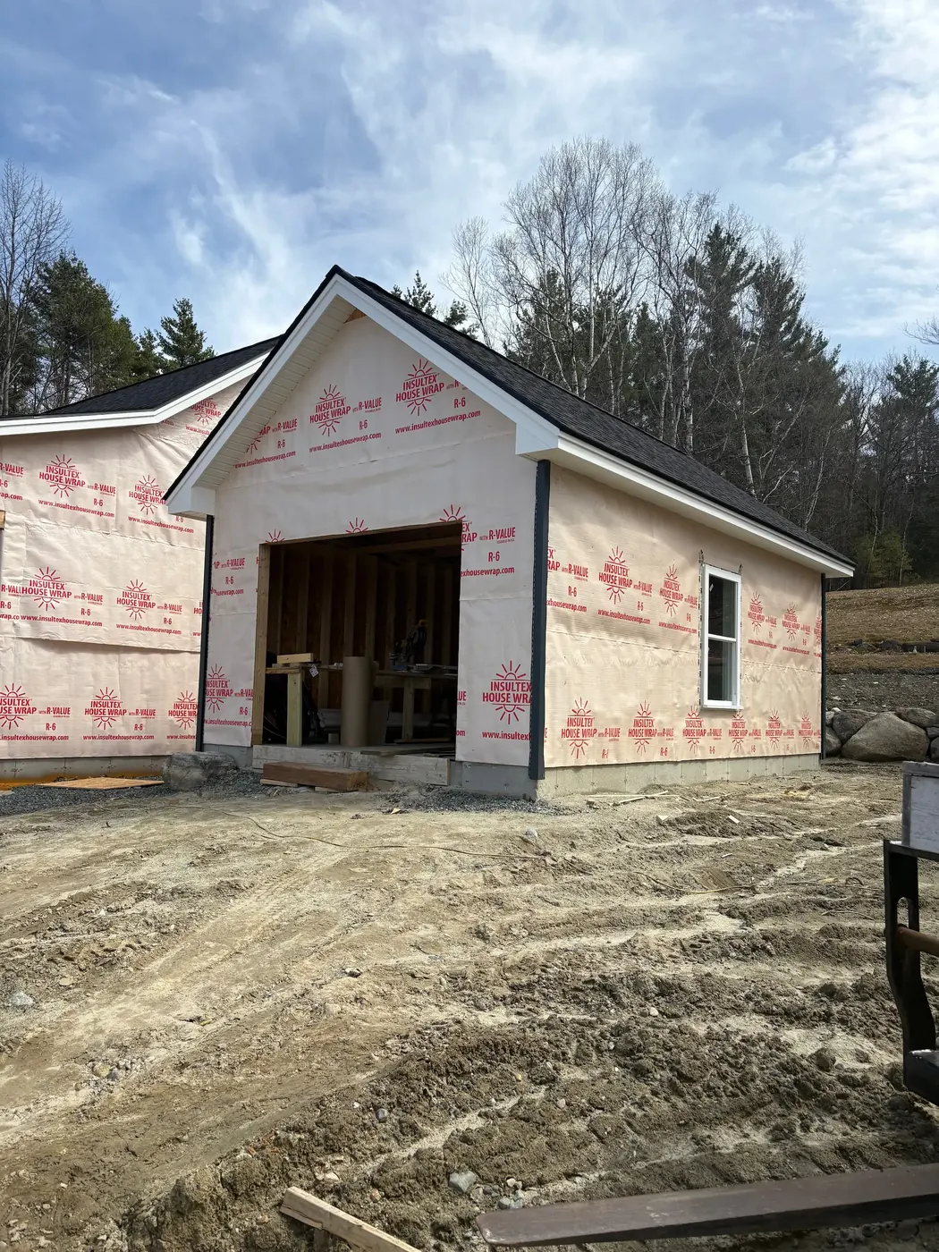 Garage addition framed, sheathed and wrapped