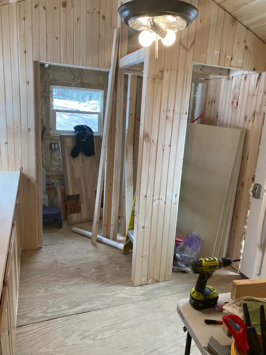New interior walls framed and paneled in pine
